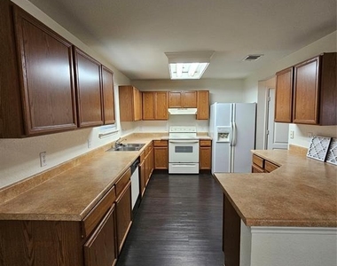 7020 Doyal Dr - Photo Thumbnail 4