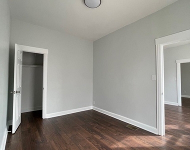 916 W 68th Street - Photo Thumbnail 6