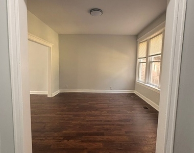 916 W 68th Street - Photo Thumbnail 1