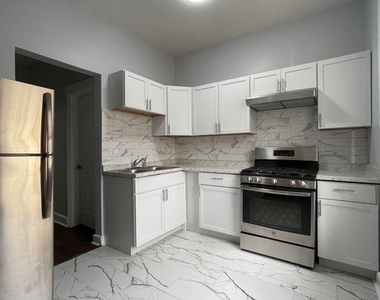 916 W 68th Street - Photo Thumbnail 7