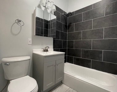 916 W 68th Street - Photo Thumbnail 11
