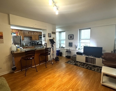 40 E 9th Street - Photo Thumbnail 1
