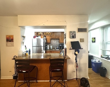 40 E 9th Street - Photo Thumbnail 2