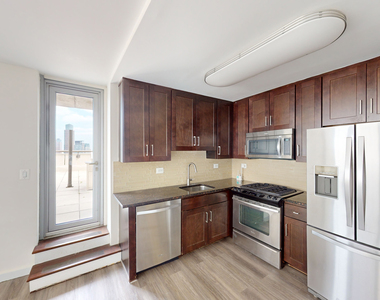 401 E 34th St - Photo Thumbnail 1