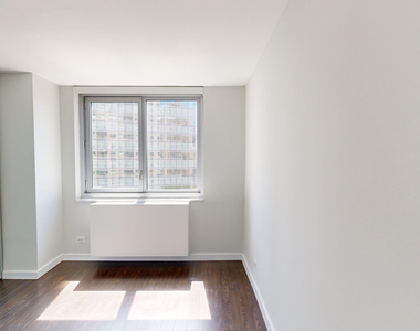 401 E 34th St - Photo Thumbnail 3