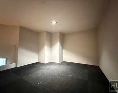 W 51st St. - Photo Thumbnail 3