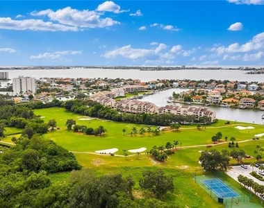 5950 Pelican Bay Plaza S - Photo Thumbnail 3