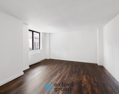 E 33rd St. - Photo Thumbnail 4