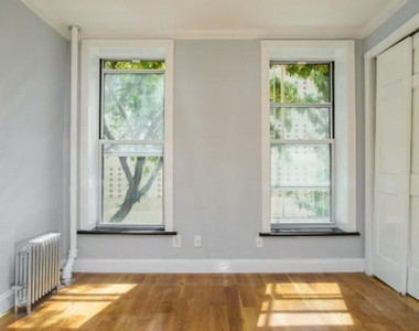 W 53rd St. - Photo Thumbnail 3