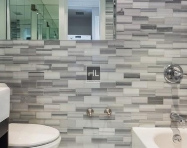 W 53rd St. - Photo Thumbnail 2