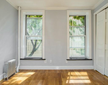 W 53rd St. - Photo Thumbnail 2