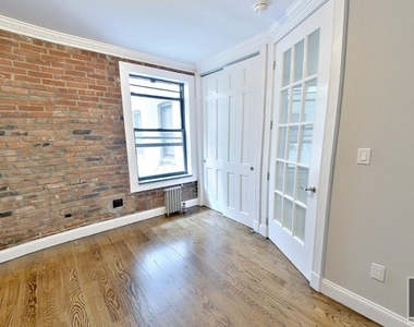 E 100th St. - Photo Thumbnail 2