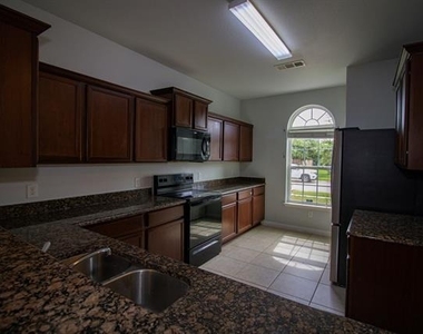 223 Magnolia Drive - Photo Thumbnail 1