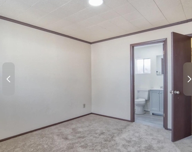 1005 N Center Avenue - Photo Thumbnail 1
