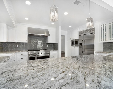 9618 Kentland Avenue - Photo Thumbnail 11
