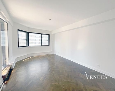 E 69th St, - Photo Thumbnail 11