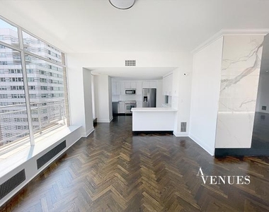 E 69th St, - Photo Thumbnail 3