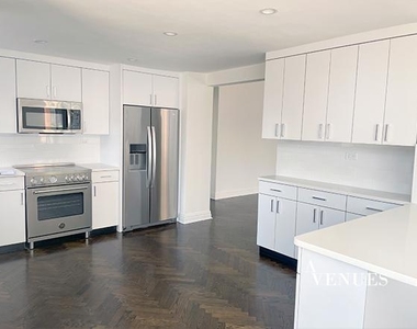 E 69th St, - Photo Thumbnail 4