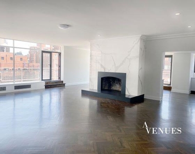 E 69th St, - Photo Thumbnail 1