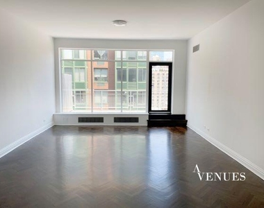 E 69th St, - Photo Thumbnail 6