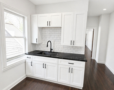 5518 W Melrose Street - Photo Thumbnail 4