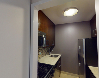 401 E 34th St - Photo Thumbnail 1