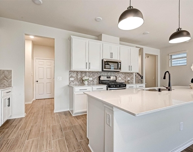 10311 Harmon Smith Drive - Photo Thumbnail 10