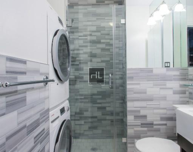 E 13th St. - Photo Thumbnail 4