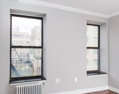 E 100th St. - Photo Thumbnail 2
