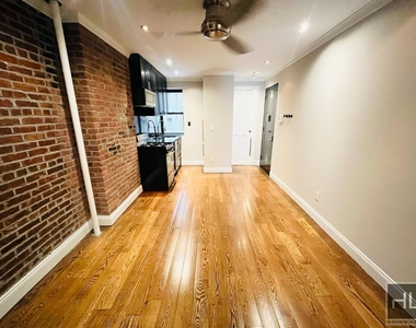 W 52nd St. - Photo Thumbnail 2