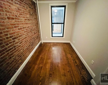 W 52nd St. - Photo Thumbnail 5