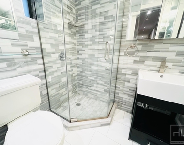 W 52nd St. - Photo Thumbnail 6