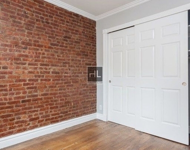 E 13th St. - Photo Thumbnail 3