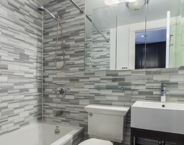 E 7th St. - Photo Thumbnail 2
