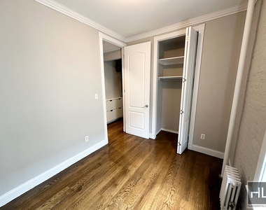 E 6th St. - Photo Thumbnail 1