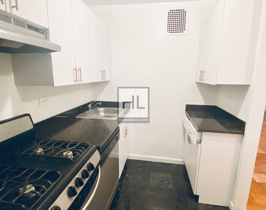 E 82 St - Photo Thumbnail 1