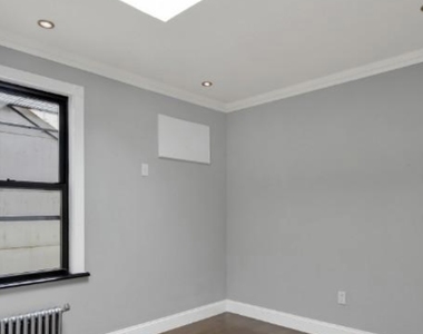 East 26th Street - Photo Thumbnail 7