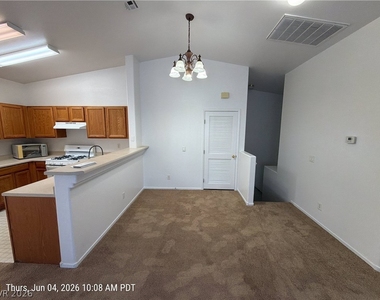 6405 Rusticated Stone Avenue - Photo Thumbnail 4