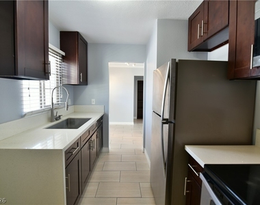 1003 E Clark Avenue - Photo Thumbnail 3