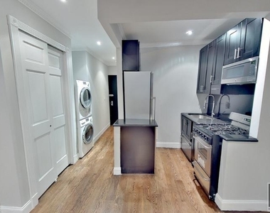 E 26th St. - Photo Thumbnail 3