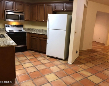 8625 E Belleview Place - Photo Thumbnail 4