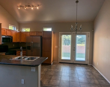 9857 E Empress Avenue - Photo Thumbnail 3