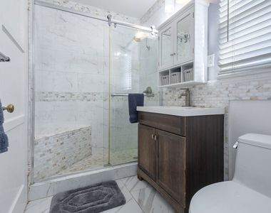 119 S Bundy Drive - Photo Thumbnail 3