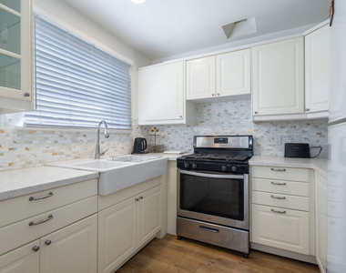 119 S Bundy Drive - Photo Thumbnail 2