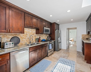 8221 Delgany Avenue - Photo Thumbnail 28