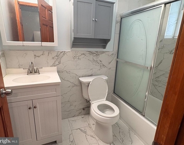 1318 W Girard Avenue - Photo Thumbnail 3