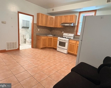 1318 W Girard Avenue - Photo Thumbnail 2