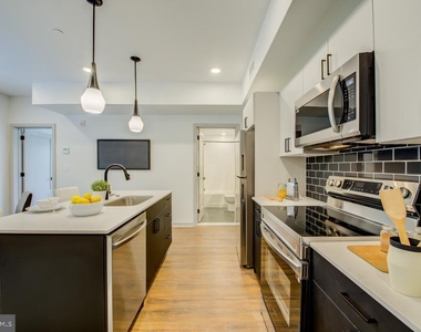 5001 Umbria Street - Photo Thumbnail 3