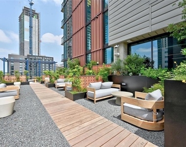 84 East Ave - Photo Thumbnail 32