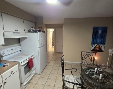 4901 Victoria Drive - Photo Thumbnail 3